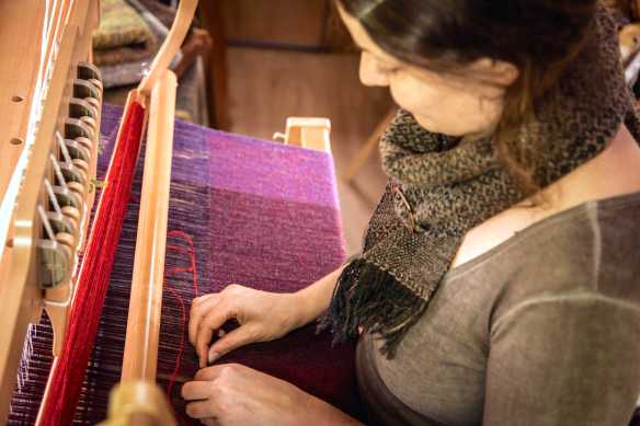 Edge-sewing the weaving by Alice Carfrae
